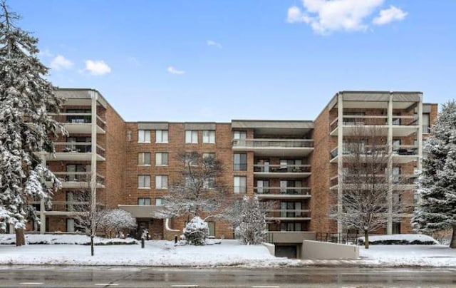 view of snow covered property