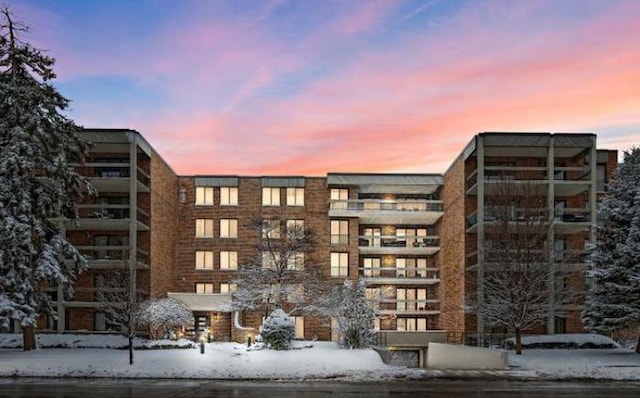 view of snow covered property