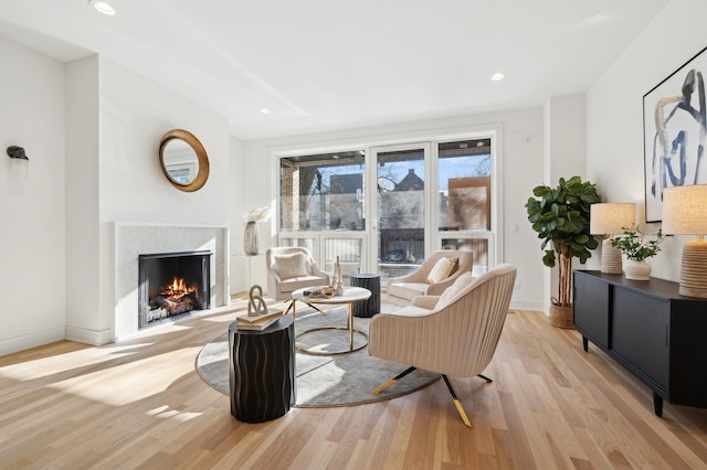 living room with light hardwood / wood-style flooring