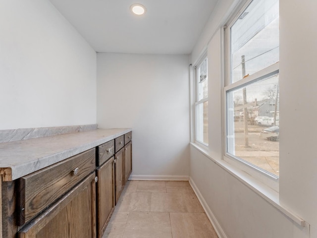 bar featuring a wealth of natural light