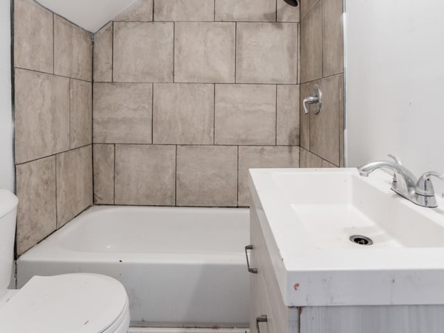 full bathroom featuring separate shower and tub, vanity, and toilet