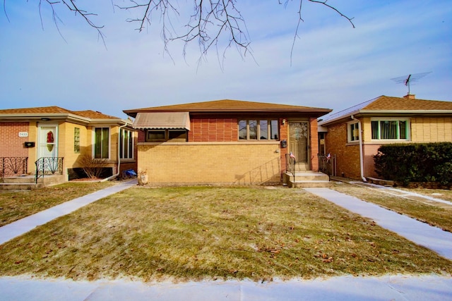 view of front of home with a front yard