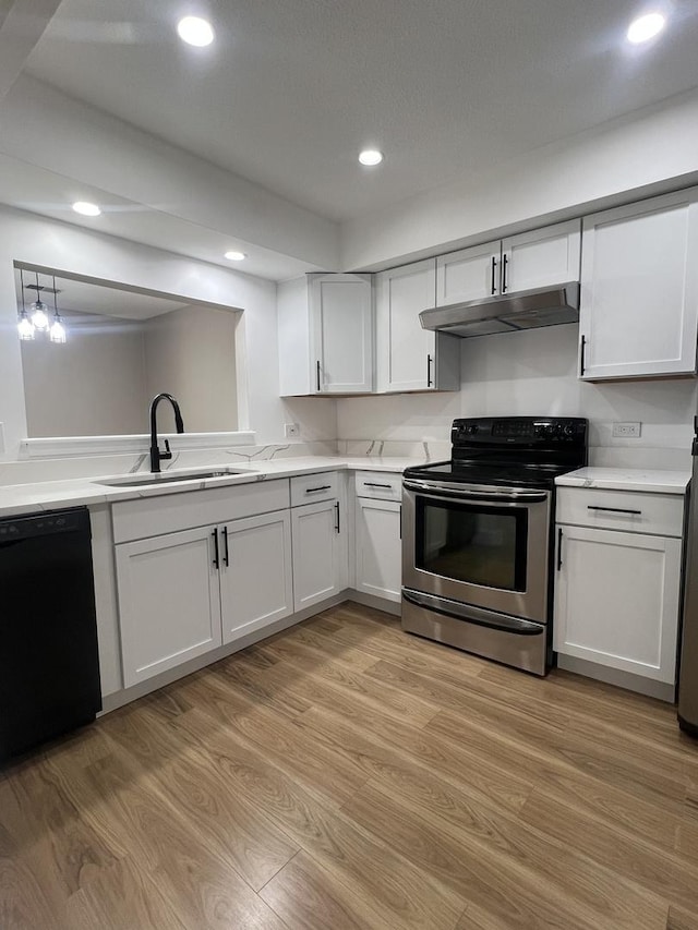 kitchen featuring electric range, sink, black dishwasher, white cabinets, and light wood-type flooring