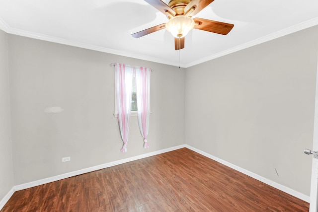 empty room with ceiling fan, wood-type flooring, and ornamental molding