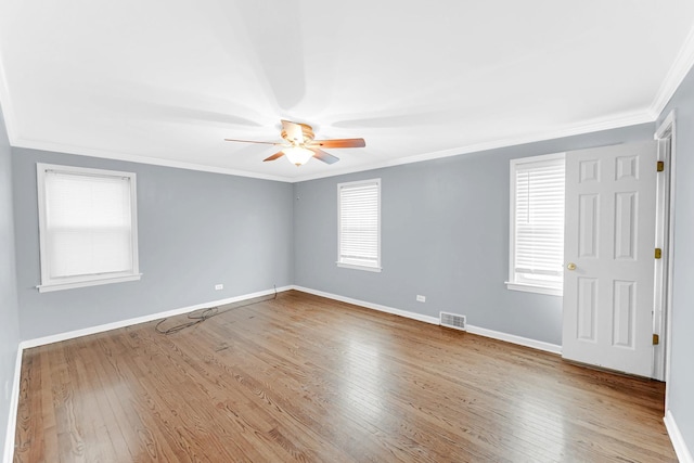 unfurnished room featuring crown molding, ceiling fan, and wood-type flooring