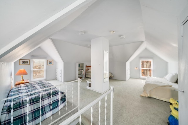 bedroom featuring light carpet and vaulted ceiling