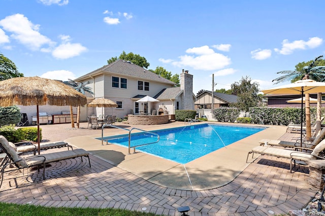 view of pool with a gazebo and a patio