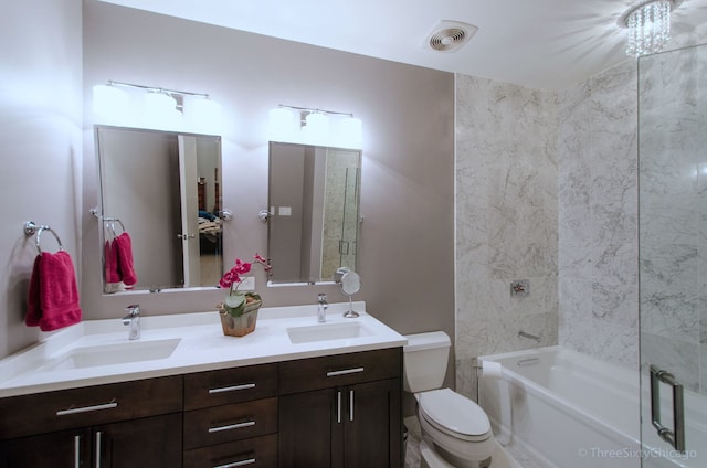 full bathroom with vanity, shower with separate bathtub, and toilet