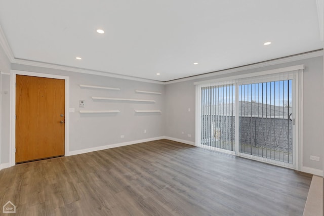 interior space featuring hardwood / wood-style flooring and ornamental molding