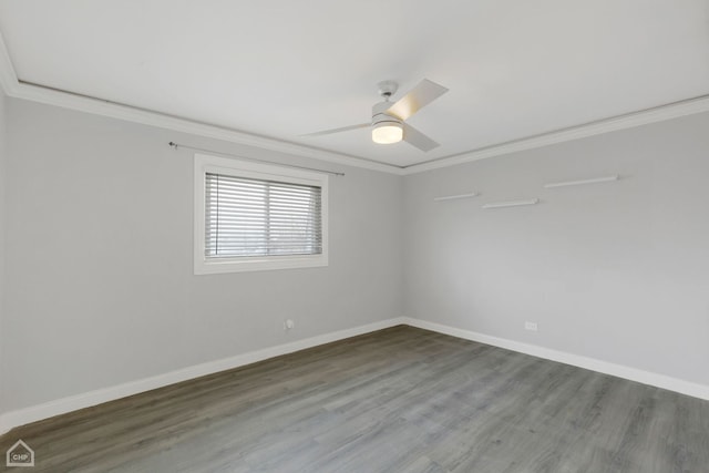 spare room with ceiling fan, wood-type flooring, and crown molding