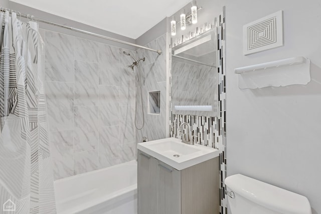 full bathroom with vanity, toilet, and shower / bathtub combination with curtain