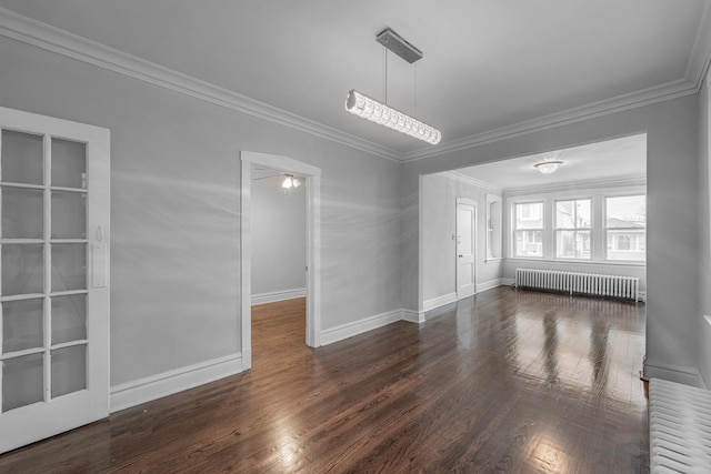 empty room with dark wood-type flooring, radiator, ornamental molding, and ceiling fan