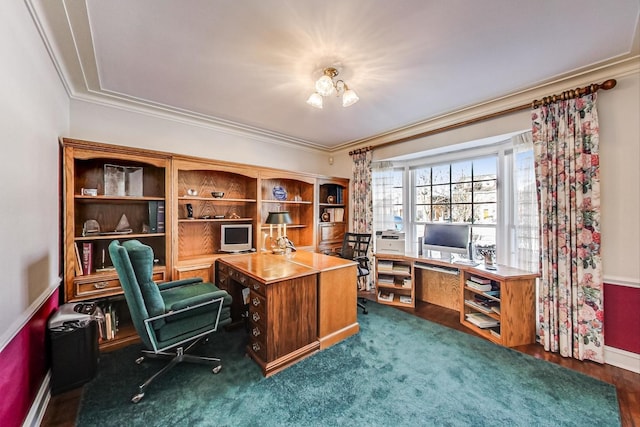 carpeted home office with ornamental molding and a notable chandelier