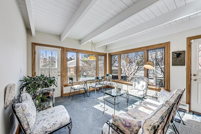 sunroom featuring a baseboard heating unit and beam ceiling