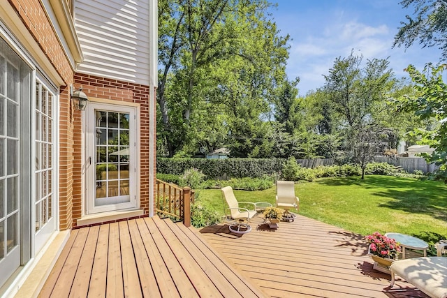 deck featuring a yard