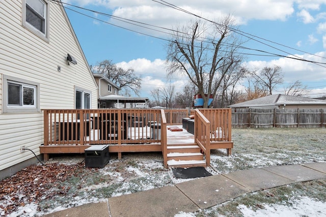 view of snow covered deck