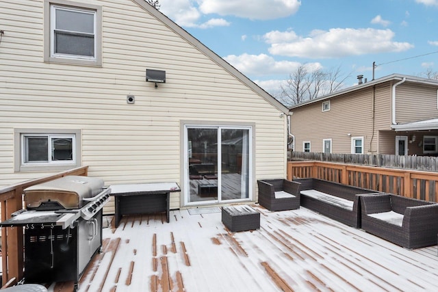 wooden terrace featuring area for grilling and outdoor lounge area