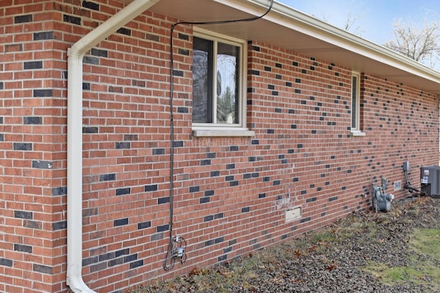 view of home's exterior with central AC unit