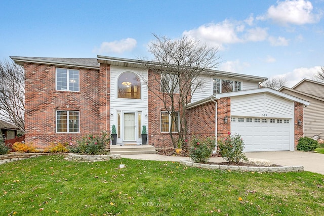 view of front property featuring a front yard and a garage