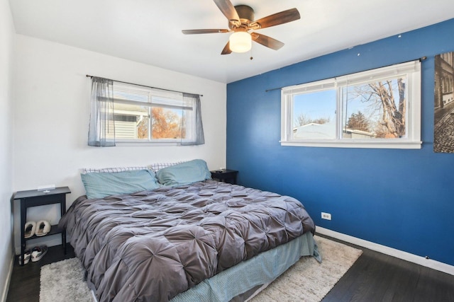 bedroom with hardwood / wood-style flooring and ceiling fan