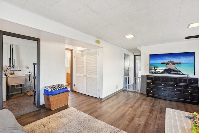 living room featuring dark hardwood / wood-style flooring