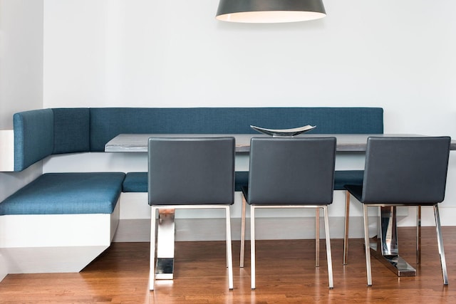 dining room with hardwood / wood-style floors