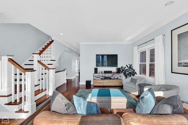 living room featuring crown molding and dark hardwood / wood-style flooring