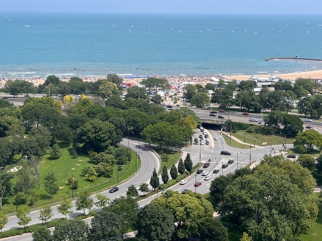 aerial view featuring a view of the beach and a water view