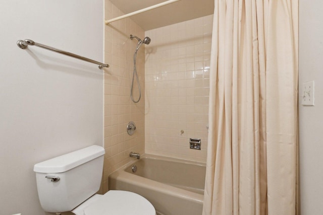 bathroom with shower / bath combination with curtain and toilet