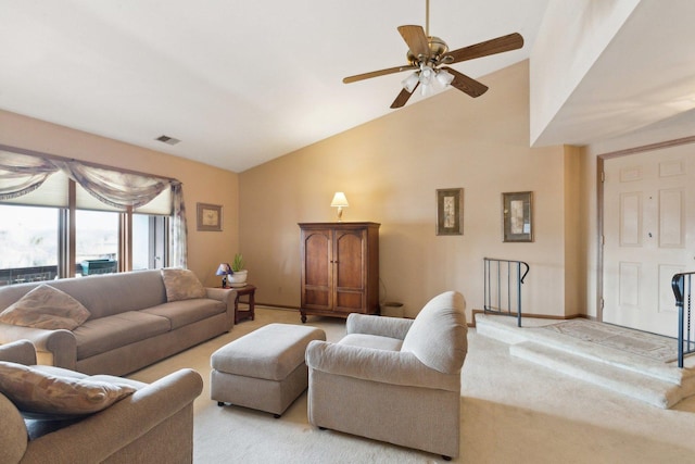 living room with light carpet, ceiling fan, and lofted ceiling