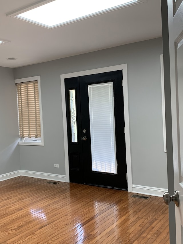 foyer entrance featuring light hardwood / wood-style floors