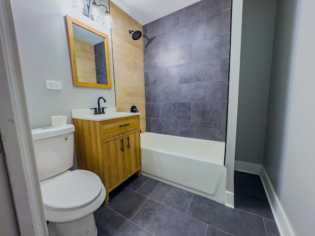 full bathroom with tile patterned flooring, vanity, toilet, and tiled shower / bath