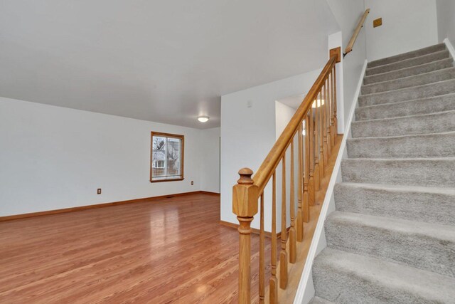 empty room with light hardwood / wood-style floors