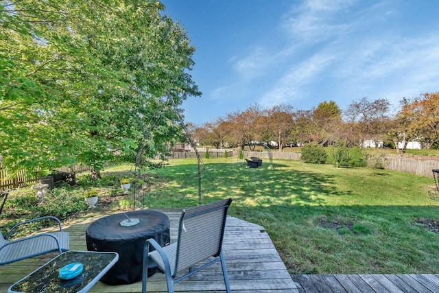 view of yard with a wooden deck