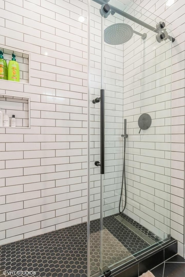 bathroom featuring walk in shower