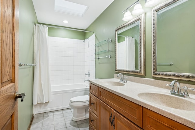 full bath with shower / tub combo, a sink, toilet, and tile patterned floors