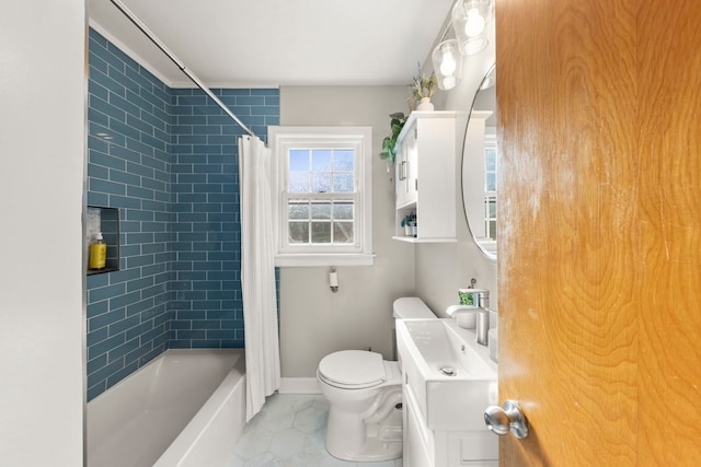 full bathroom with vanity, toilet, and shower / bath combo with shower curtain