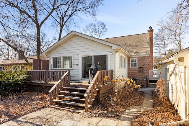 rear view of house with a deck