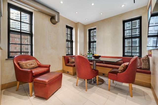 living area featuring light tile patterned floors