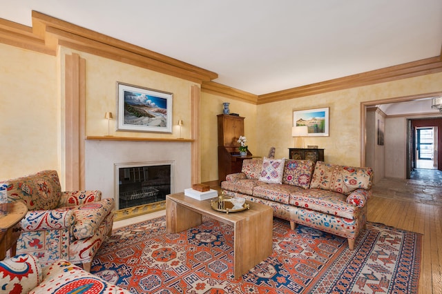 living room featuring ornamental molding and hardwood / wood-style flooring