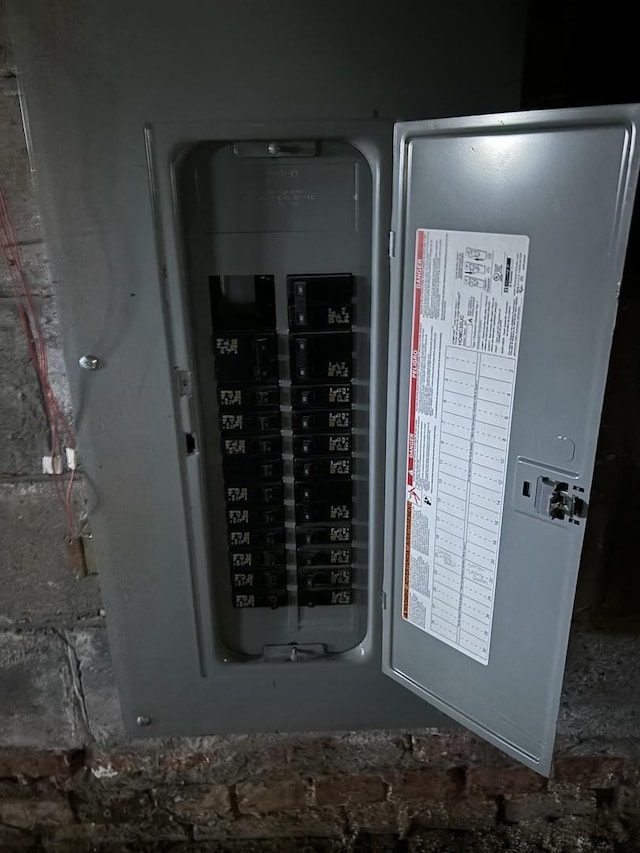 utility room featuring electric panel