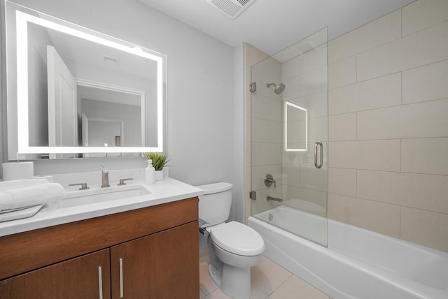 full bathroom with bathing tub / shower combination, visible vents, toilet, vanity, and tile patterned floors