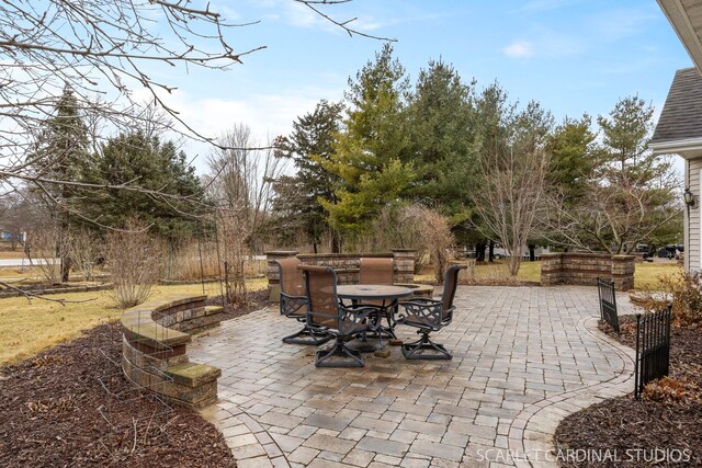 view of patio with outdoor dining area