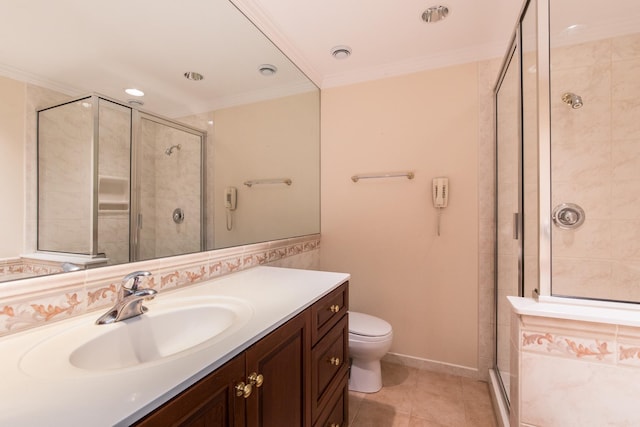 bathroom featuring ornamental molding, a shower stall, vanity, and tile patterned floors