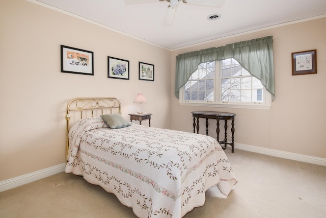 bedroom featuring ornamental molding, carpet flooring, and baseboards