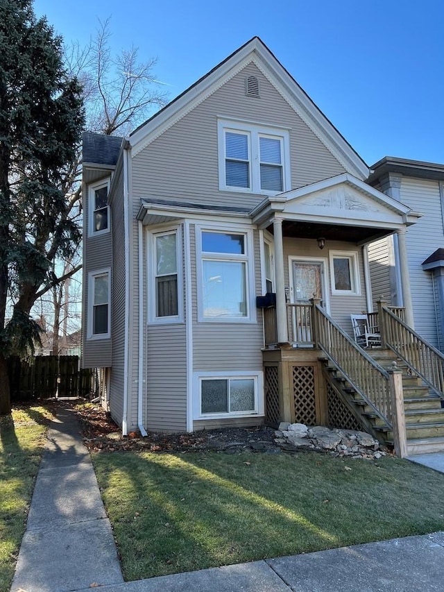 view of front of home with a front lawn