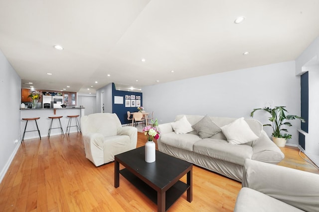 living room with light hardwood / wood-style floors