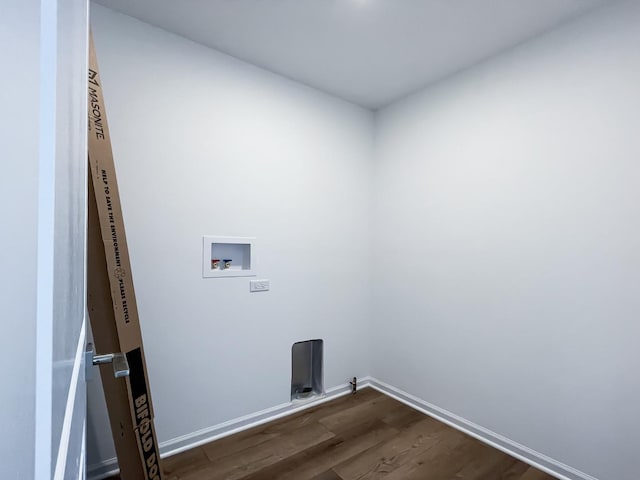 laundry area featuring washer hookup and dark hardwood / wood-style floors