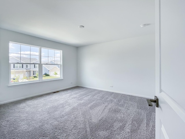 view of carpeted spare room