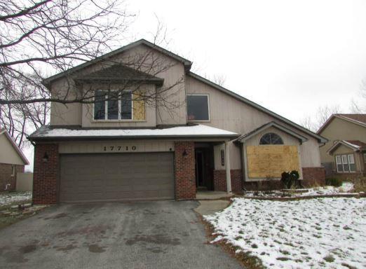 view of property featuring a garage